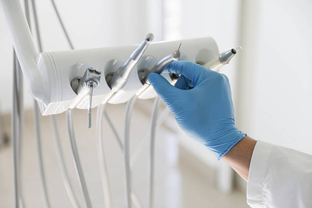 Professional Emergency Dentist technician working in Bronx, NY